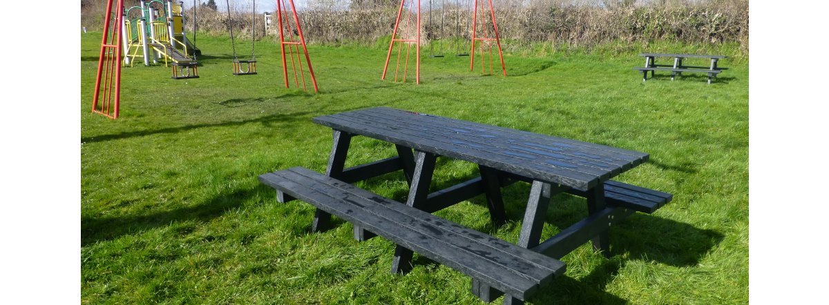 Picnic tables and playground swings